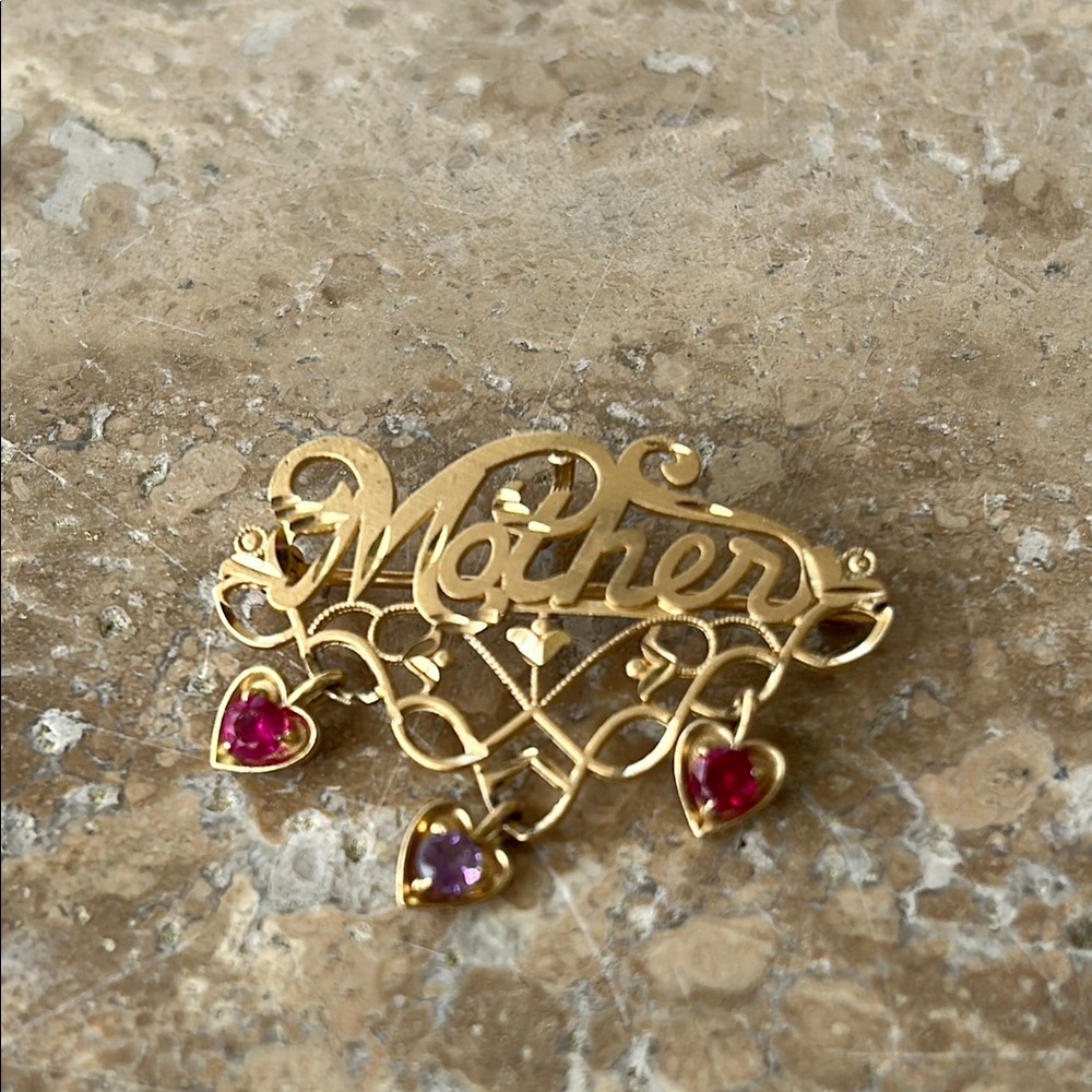 Elegant Gold and Red Floral Brooch